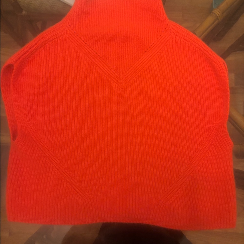 Vibrant coral cashmere Turtleneck Sweater from Anthropologie